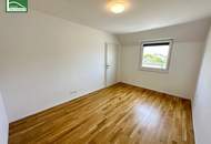 Wohnen im Grünen! Klimatisierte Wohnung mit Weitblick und großer Terrasse in Essling! Lobau und Kirschenallee ums Eck!