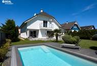 Stilvolles Designhaus mit Pool und großzügige Garage – Wohnen auf höchstem Niveau