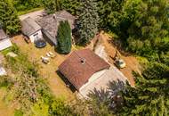 Zwei Häuser. Ein Rückzugsort. Ihre grüne Oase vor den Toren Wiens.