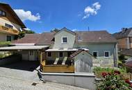 Kleines Markthaus mit Carport und kleinem Garten