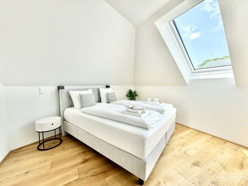 Stilvolle Dachgeschossresidenz mit hochwertiger Ausstattung und urbanem Wohnkomfort | ZELLMANN IMMOBILIEN
