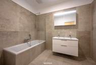 Sanierter Altbau mit modernem Neubau