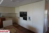 Exklusive Eigentumswohnung am See mit Privatstrand