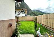 Bungalow mit Garage und Garten