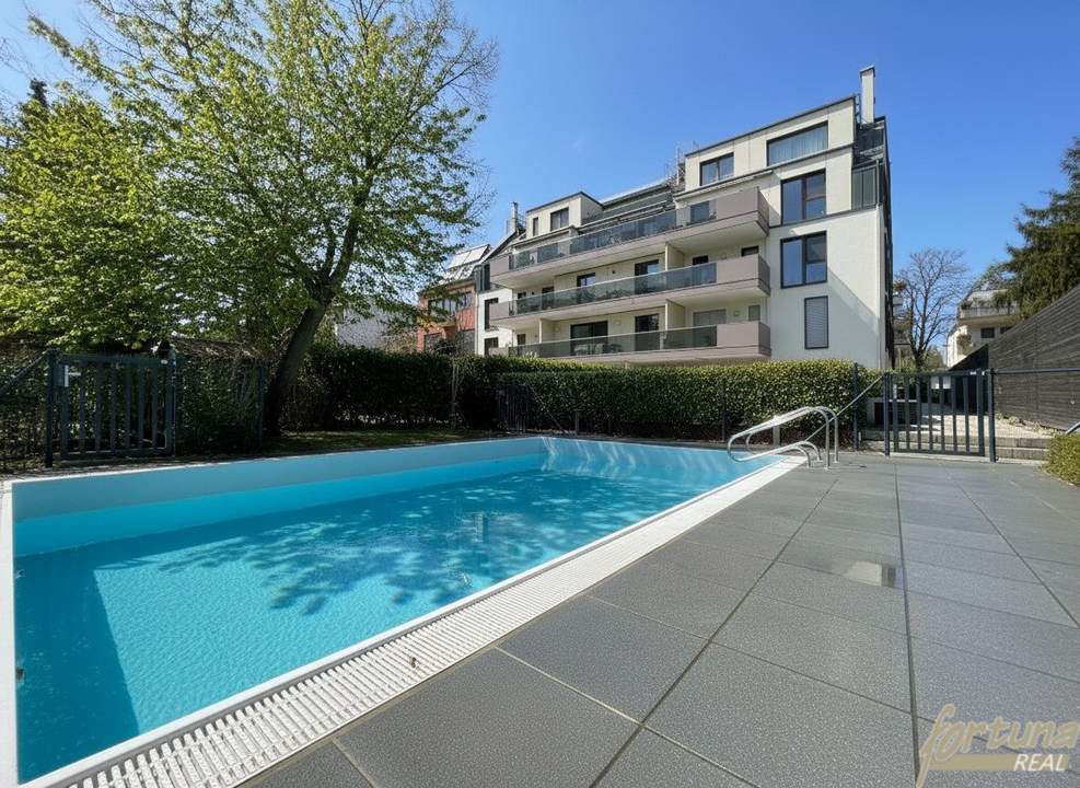 Moderne 3-Zimmer-Mietwohnung mit Balkon, Kühlfunktion, beheiztem Pool & Tiefgarage