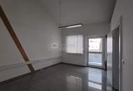 Moderne Geschäftsfläche mit Empfangsbereich und separatem Zimmer