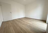 Erstbezug "ein viertel grün" – stilvolle 3-Zimmer-Wohnung mit Balkon