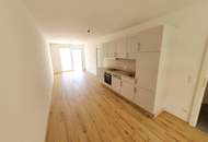 Geförderte Neubauwohnung mit Balkon im 1. Stock