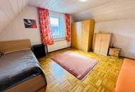 Sanierungsbedürftiges Einfamilienhaus auf großzügigem Grundstück in begehrter Lage!