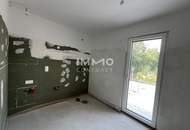 Ein Haus mit Blick zur Burg Kreuzenstein