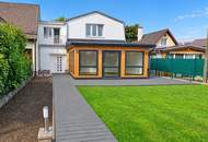 Modernisiertes Einfamilienhaus mit Holz-Wintergarten und großem Garten in Grünruhelage