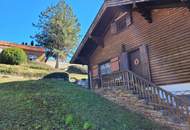 Idyllisches Holzblockhaus in Naturrandlage