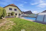 Energieeffizientes, großzügiges Einfamilienhaus mit Pool, sonnigem Garten und beheiztem Wintergarten!