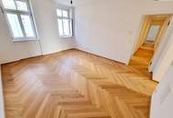 Ein Altbau, der verzaubert! Umfangreich und hochwertig sanierte Wohnschönheit mit großem Balkon und effizienter Erdwärme! Viel Privatsphäre + Viel Raum + Viel Grün!