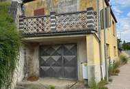 Mehrfamilienhaus mit Werkstatt, Garagen und Nebengebäuden – Sanierungsobjekt mit Potenzial