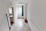 Sanierungsbedürftige Gartenwohnung in charaktervollen Altbau