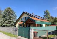 EXKLUSIVES SEEHAUS AM NEUFELDER SEE – MODERNES WOHNEN MIT PRIVATEM WASSERZUGANG