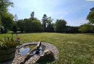 Wohnhaus mit 2.200m² großem Grundstück, Halle und Garagen