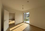 Charmante Gartenwohnung - 2 Zimmer plus Küche - südseitige Ruhelage - Erstbezug - Fußbodenheizung - WP &amp; Solar