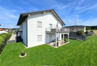 Moderne Gartenwohnung mit großzügigen Terrassen in sonniger Ruhelage