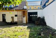 Mehrfamilienhaus mit Garten