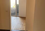 Moderne Gartenwohnung mit Charme und Bergblick