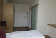 Apartmenthaus mit 8 Eigentumswohnungen sowie eine Großwohnung und Gewerbetrakt in sehr ruhiger Grünlage