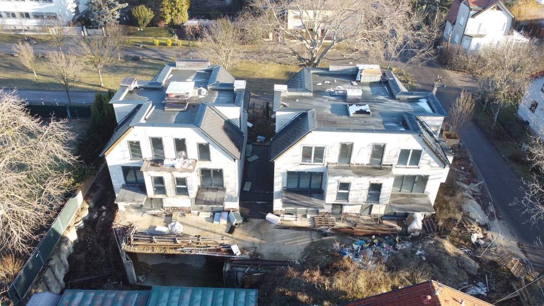 Edelrohbau mit 10 Wohnungen und 12 Kfz-Abstellplätzen