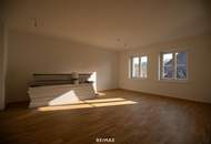 Neubauwohnung im Stadtzentrum mit Ausbaupotenzial & Dachterrasse