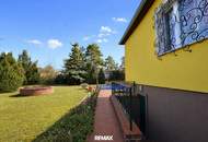 Licht, Luft und Freiheit: Bungalow mit großem 1.622 m2 Garten und Pool