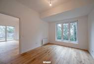 Sanierter Altbau mit modernem Neubau