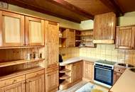 "Charmantes Einfamilienhaus mit Terrasse, Garage und zusätzlichem Grundstück"