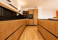 "Designküche mit Kücheninsel | 3 Zimmer | Hochwertig saniert | Loggia | U1 Troststraße"