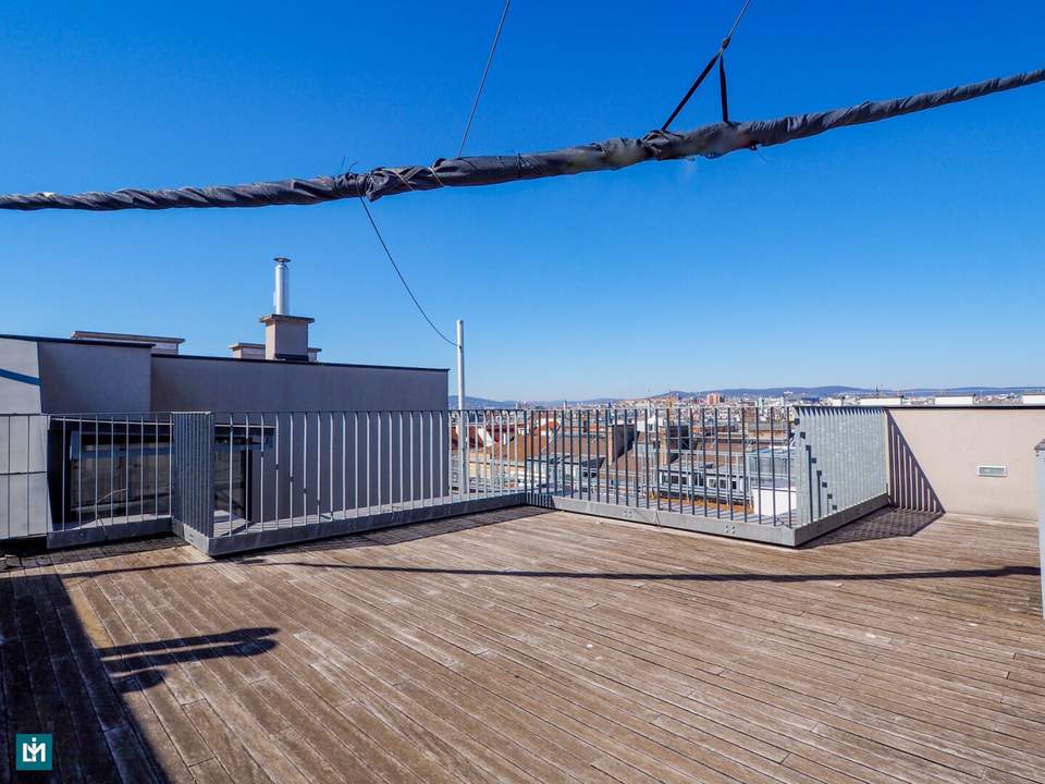 Urbaner Wohntraum mit Weitblick – Stilvolle 3-Zimmer-DG-Wohnung mit großer Dachterrasse