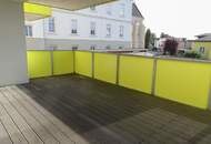 Neubauwohnung in Zentrumslage mit großer Balkon-Loggia und Carport