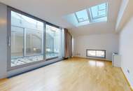 Helle Dachgeschosswohnung mit Terrassen und Blick auf die Karlskirche