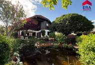 Exklusive Villa mit traumhaftem Garten – Wohnen auf höchstem Niveau in zeitloser Qualität