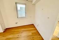 ERSTBEZUG! Geräumige Eigentumswohnung im Obergeschoss mit Balkon und größer Dachterrasse