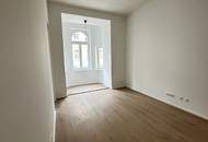 Sanierter Altbau mit Erker: Charmante 2-Zimmer-Wohnung mit separater Küche