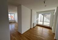 UNBEFRISTET - Helle und ruhige 2-Zimmer Dachgeschoss-Wohnung mit rd. 12 m2 Terrasse, Klimaanlage, Abstellraum und Kellerabteil