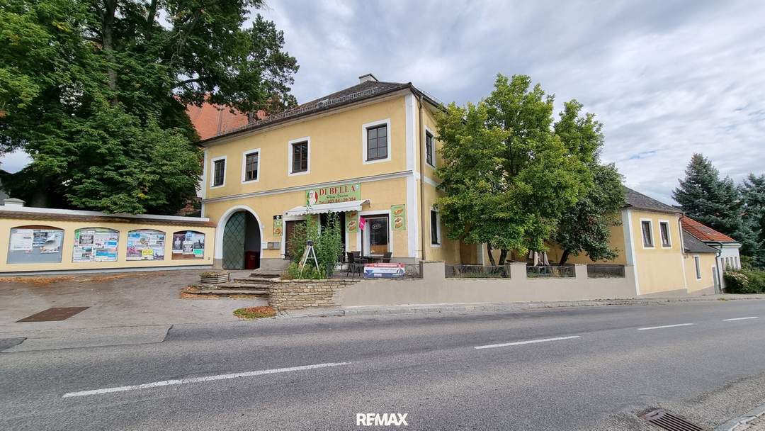 Vielseitige Immobilie mit Pizzeria und Wohnmöglichkeiten