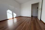 Ruhige 2-Zimmer Wohnung mit Grünblick, Terrasse und 2 Garagenplätzen