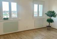 Freundliche Dachgeschoßwohnung mit Weitblick – WG geeignet!