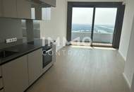 2 Zimmer Erstbezug mit atemberaubenden Blick auf die Donau! Pool, Sauna, Gym inklusive!