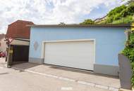 Gemütliches Einfamilienhaus mit grünem Innenhof, separatem Arbeitsbereich und Nebengebäude