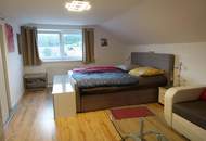 Einfamilienhaus mit drei eigenständigen Wohnungen und einzigartigem Erlebnisgarten