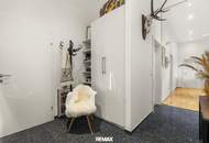 Wohnen über den Dächern von Graz mit Blick auf den Schlossberg: Exklusive Stadtwohnung mit Terrasse