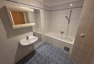 Barrierefreie Zweizimmerwohnung mit Eigengarten und Tiefgaragenstellplatz!