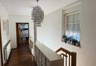 Einfamilienhaus mit Garage & Wintergarten in Ortsrandlage