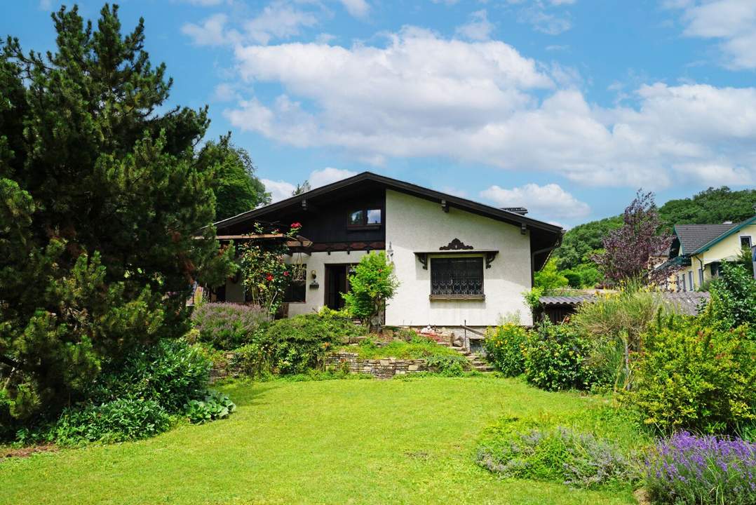 Einfamilienhaus mit Potenzial und tollem Garten an der Wiener Stadtgrenze